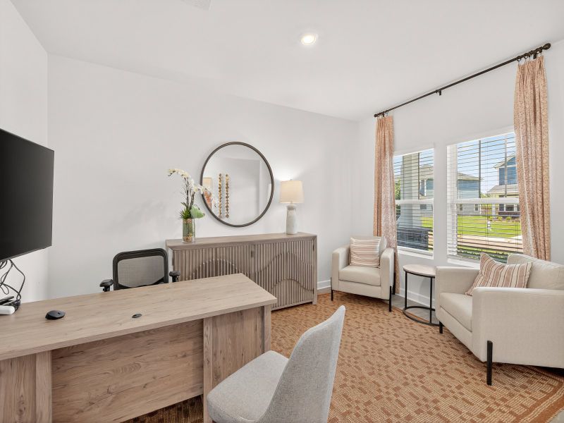 The flex room is the perfect lounge area or home office.