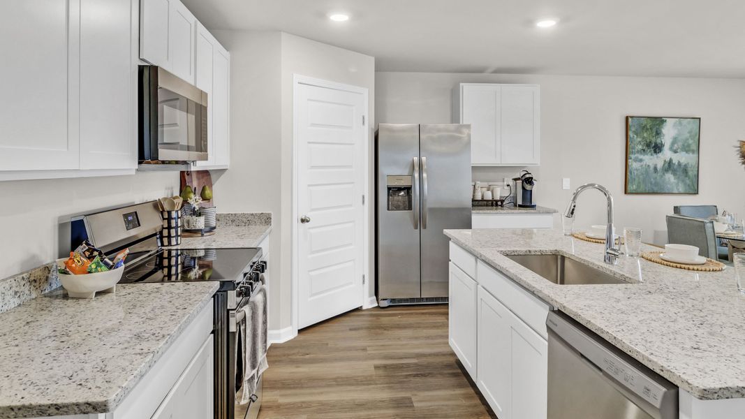 Furnished interior in a model home at Bailey Park in Fayetteville (Image 14). Furnished interior in a model home at Bailey Park in Fayetteville (Image 14).