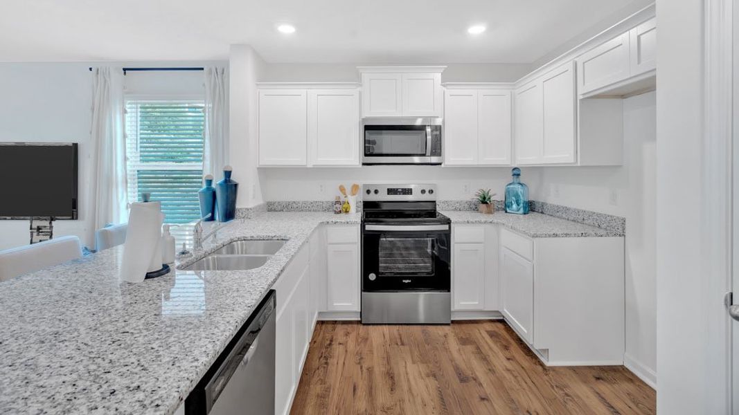 Furnished interior in a model home at Hudson Terrace Townhomes in Bristol (Image 14).