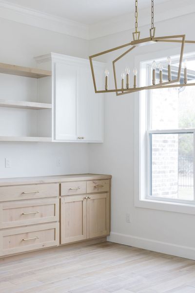 Furnished interior in a model home at Traditions in Bryan (Image 7).