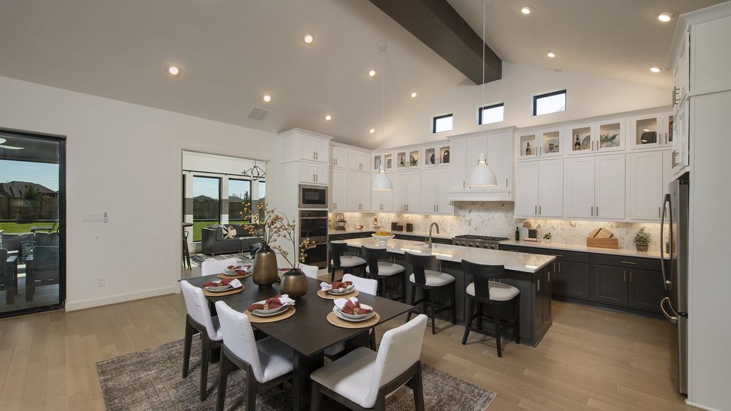 Furnished interior in a model home at Cane Island 80' in Katy (Image 13).