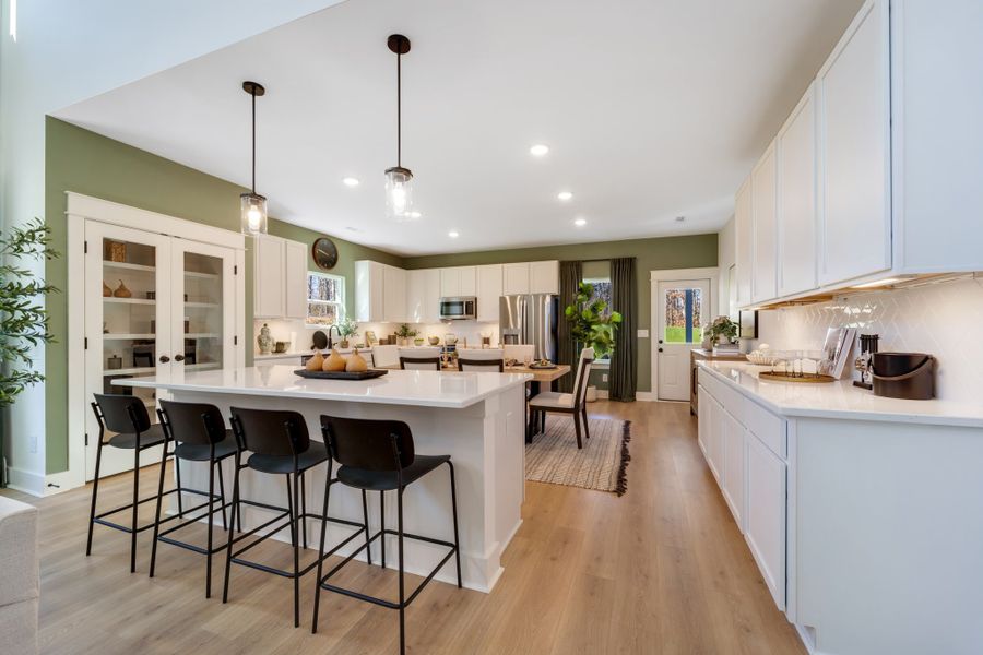 Furnished interior in a model home at Brush Creek in Fairview (Image 19).