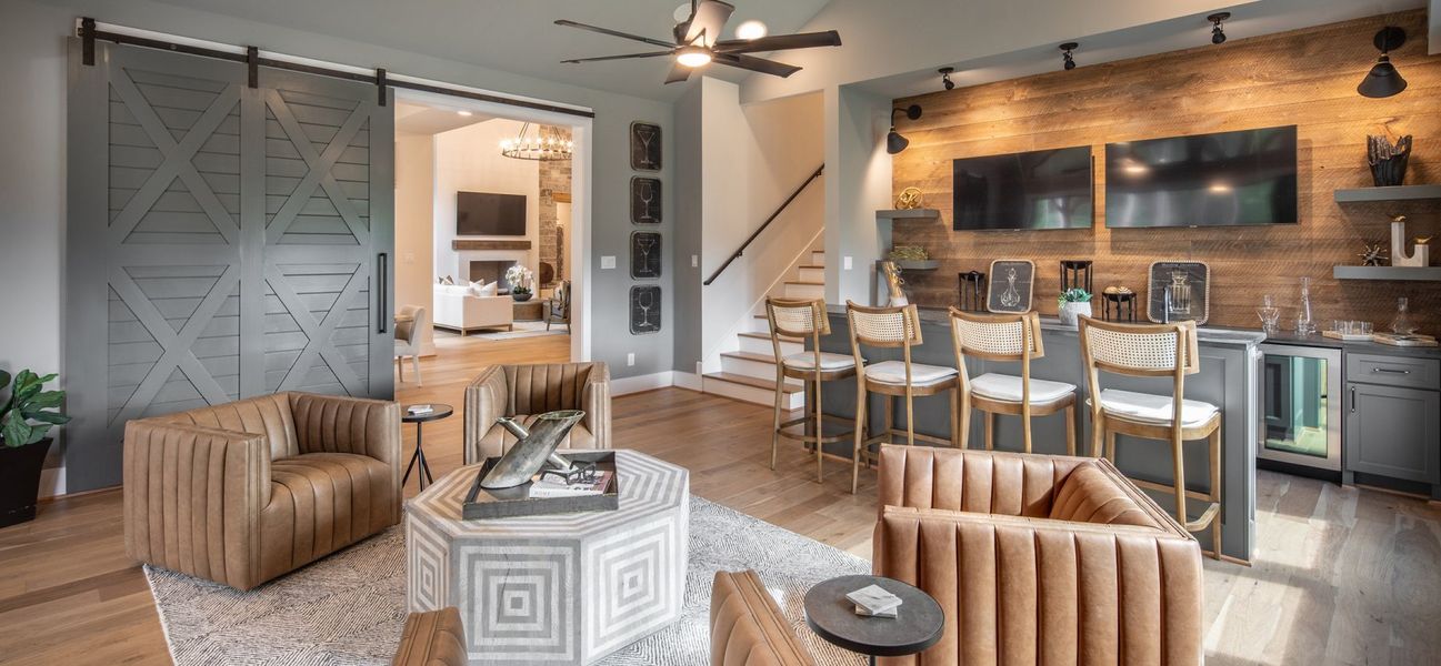 Furnished interior in a model home at Dean Farms in Lucas (Image 8).