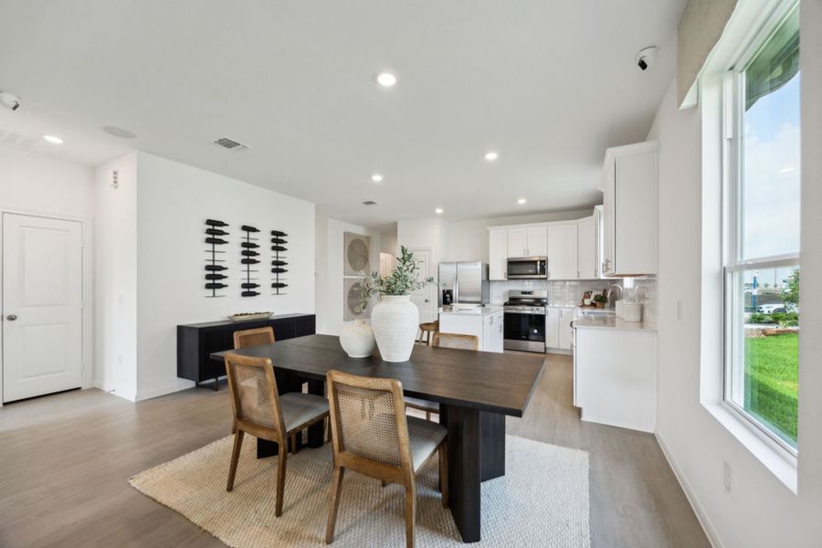 Furnished interior in a model home at Windcress in Cove (Image 16).