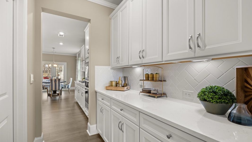 Furnished interior in a model home at Thalley Creek Estates in Cumming (Image 5).