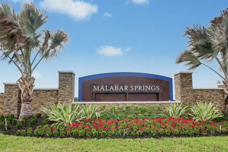 Entrance to the Malabar Springs community in Palm Bay, FL, featuring signage and landscaping (Image 1). Entrance to the Malabar Springs community in Palm Bay, FL, featuring signage and landscaping (Image 1).