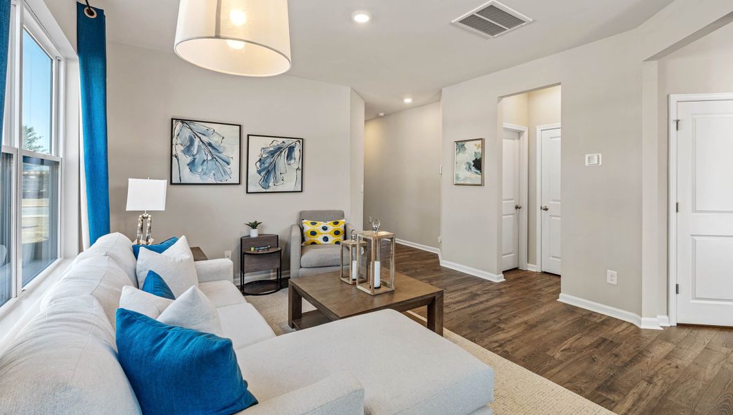 Furnished interior in a model home at Covington Village in Greer (Image 5).
