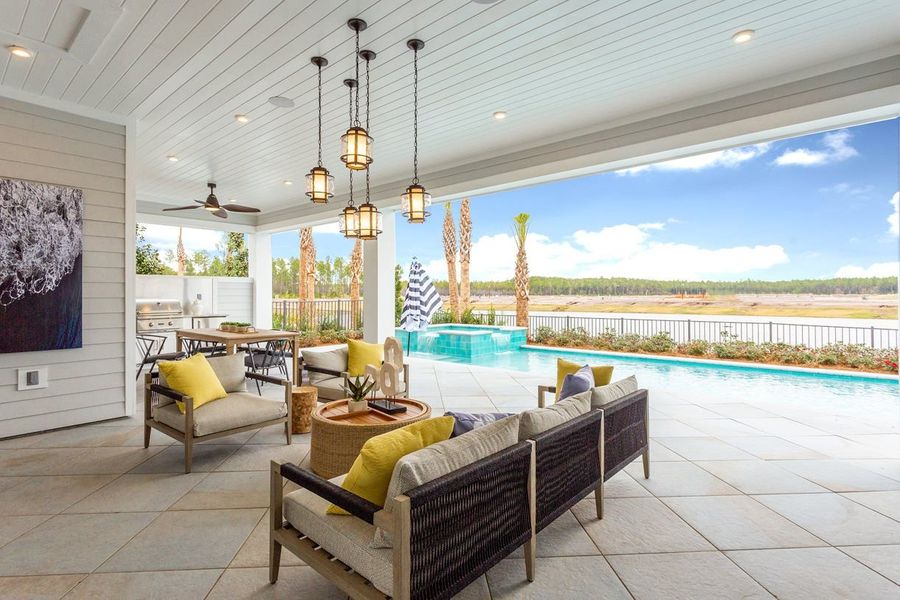 In addition to the custom Pool, the Venice model features a Covered Lanai with a Summer Kitchen.