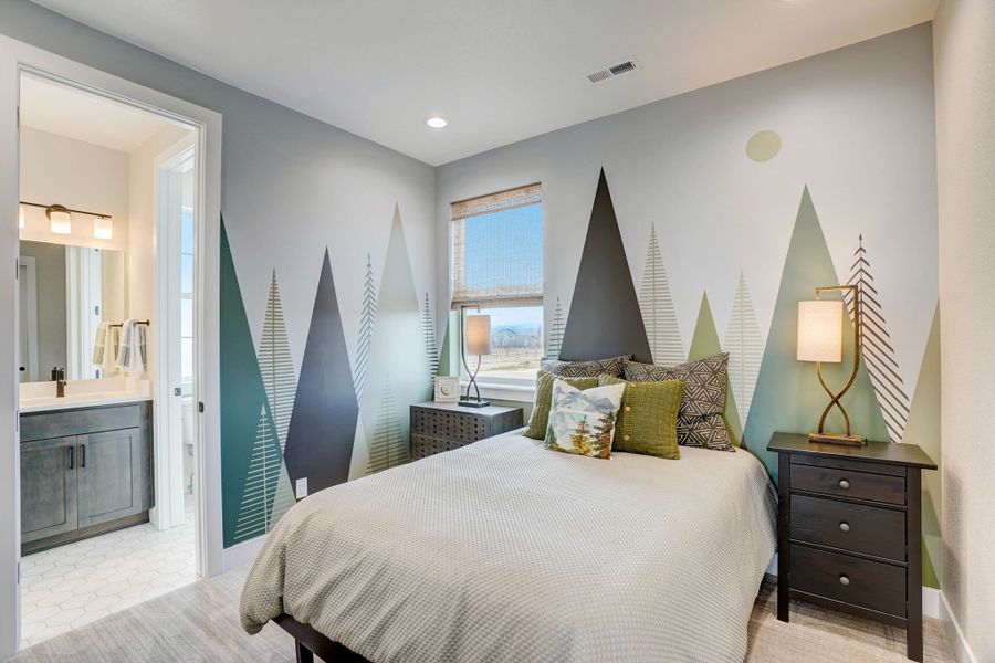 Furnished interior in a model home at Kitchel Lake at Serratoga Falls in Timnath (Image 31).