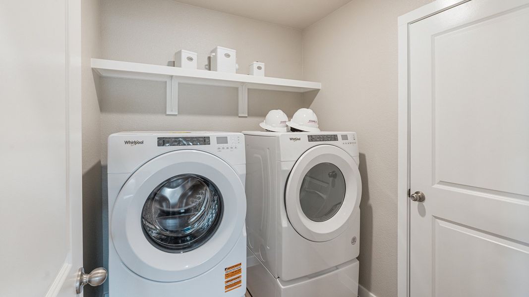 Furnished interior in a model home at Kokomo in Rockport (Image 16).