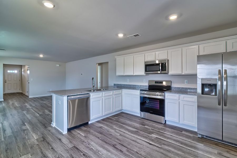 Furnished interior in a model home at Blackwood Street in Greenville (Image 12). Furnished interior in a model home at Blackwood Street in Greenville (Image 12).