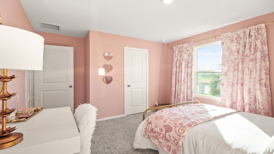 Furnished interior in a model home at New Waverly Station in New Waverly (Image 30).