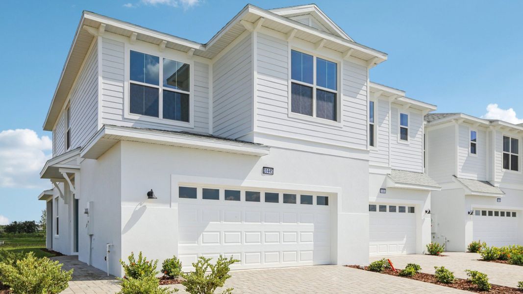 Front exterior of a home in the Isla Mirada community, located in San Antonio, FL (Image 4). Front exterior of a home in the Isla Mirada community, located in San Antonio, FL (Image 4).