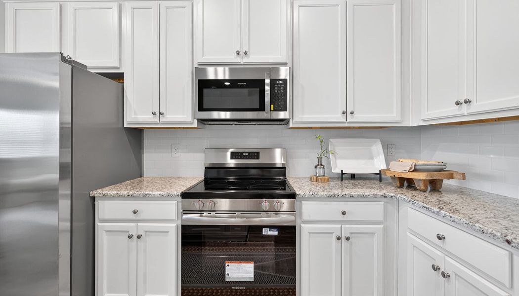 Furnished interior in a model home at The Reserve at Clocktower in Douglasville (Image 18).