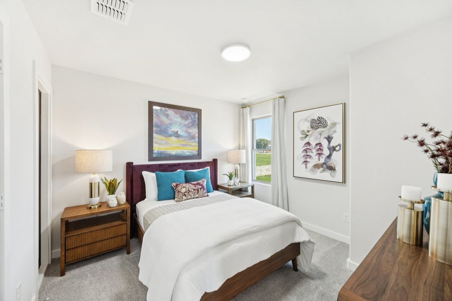 Bedroom in a Belmont Magnolia Model Home in Aubrey TX by Trophy Signature Homes Bedroom in a Belmont Magnolia Model Home in Aubrey TX by Trophy Signature Homes