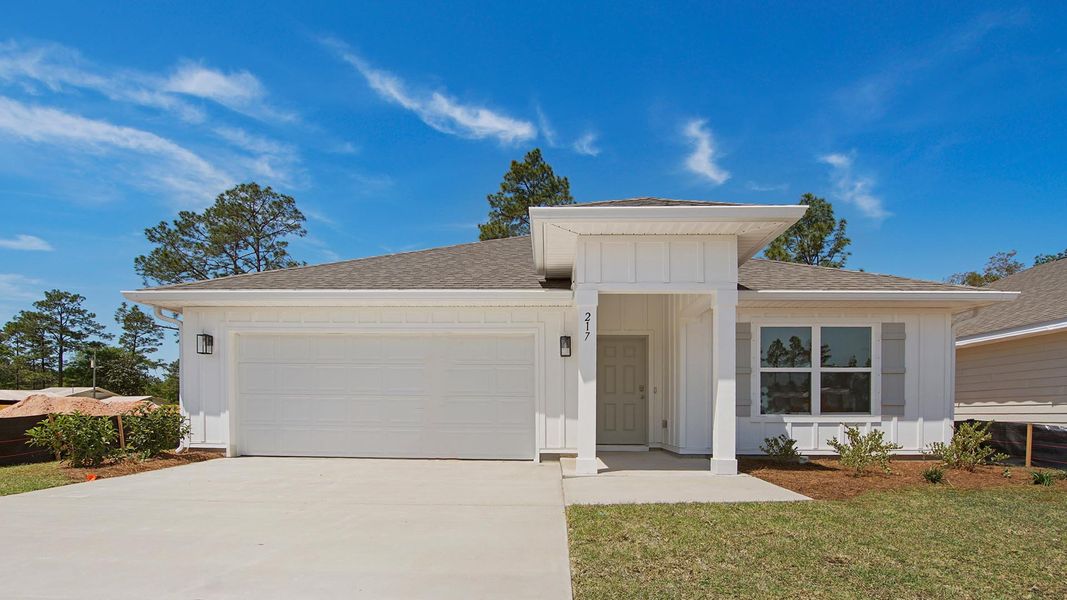 Front exterior of a home in the Ashton Park Phase III community, located in Freeport, FL (Image 8).