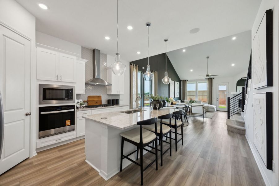 Furnished interior in a model home at Windcress in Cove (Image 7).