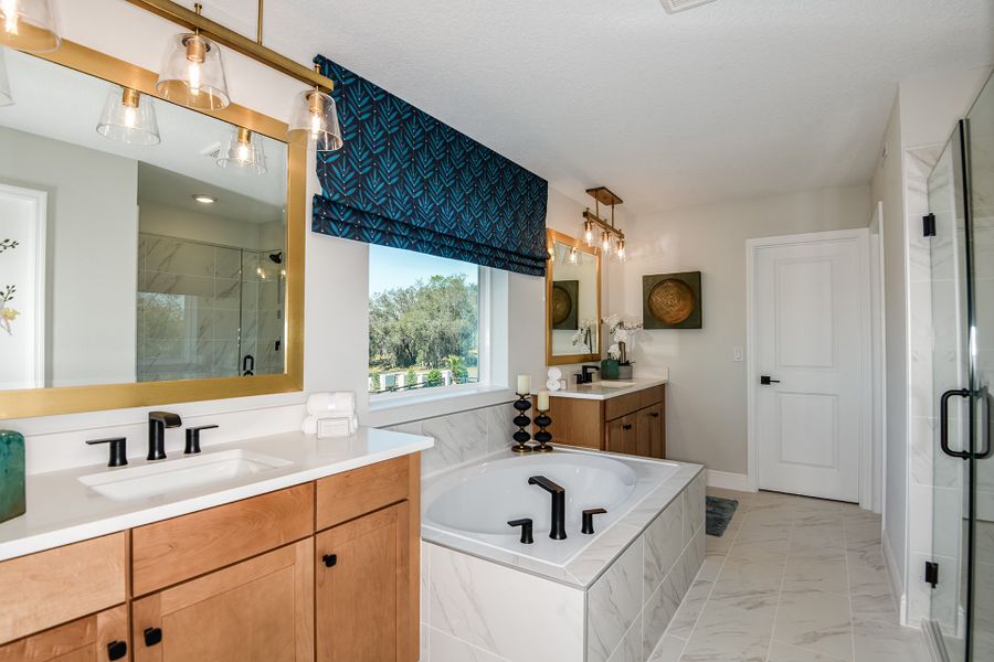 Furnished interior in a model home at Vintner Reserve in Clermont (Image 14).