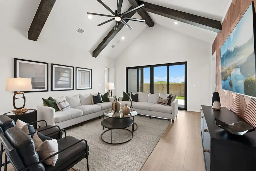 Furnished interior in a model home at East View Farms in Georgetown (Image 6).