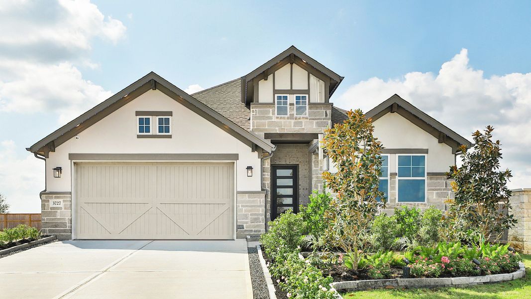 Brick facade, elegant archway, and lush landscaping define this Westland Ranch home. Brick facade, elegant archway, and lush landscaping define this Westland Ranch home.