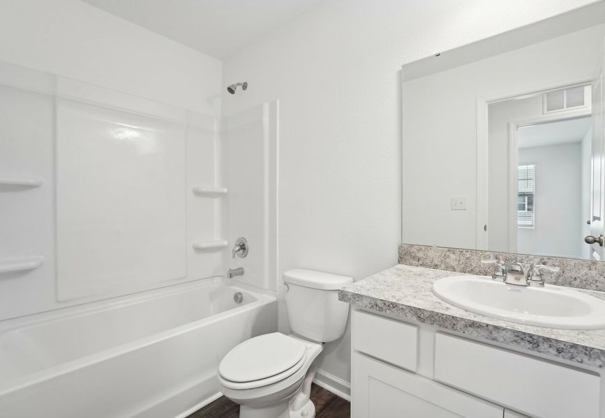 Furnished interior in a model home at Aster Towns in Summerville (Image 9).