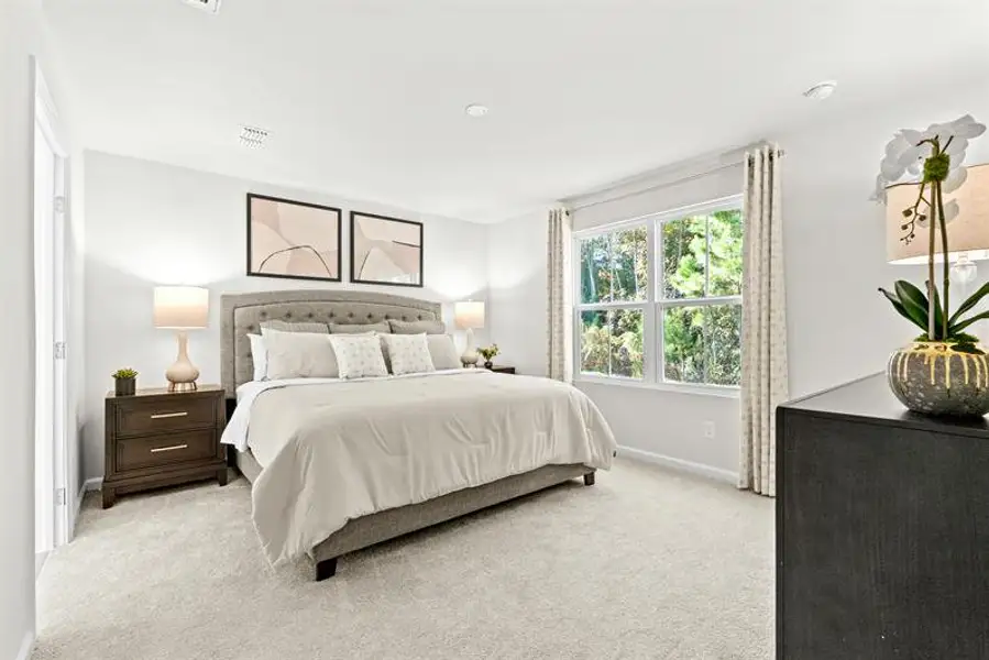 First floor owner's suite makes everyday living convenient.