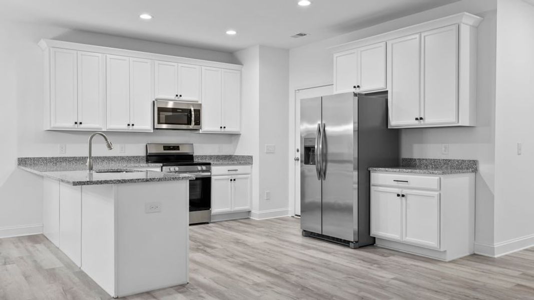 Furnished interior in a model home at Pearson Road Townhomes in Easley (Image 5).