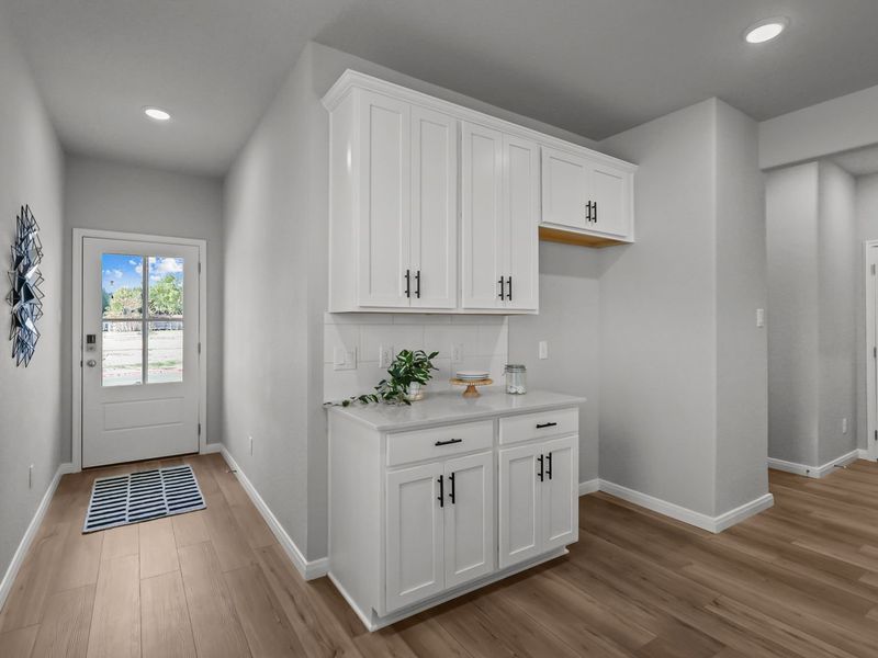 Furnished interior in a model home at Buffalo Way Villas in Houston (Image 11).