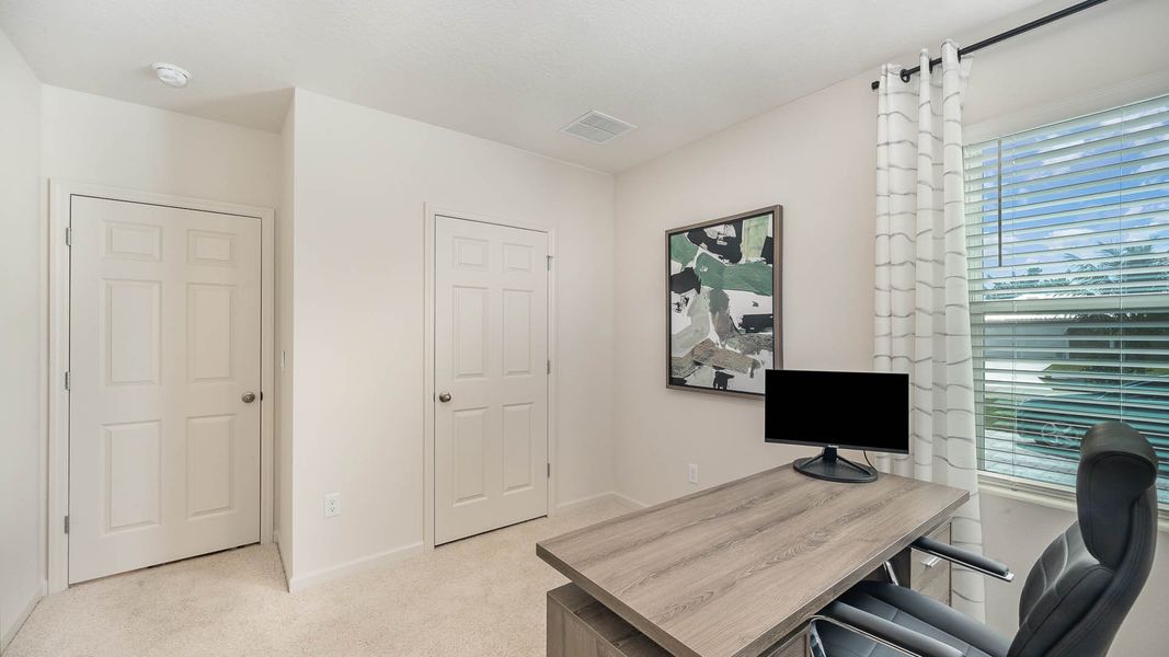 Furnished interior in a model home at Port St. Lucie Spot Lots in Port St. Lucie (Image 28).