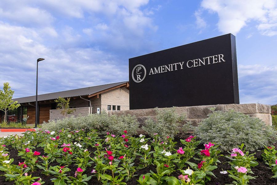 Entrance to the Parkside On The River community in Georgetown, TX, featuring signage and landscaping (Image 9).