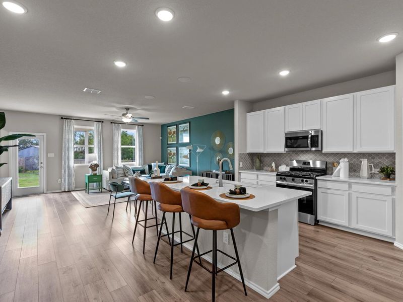 Furnished interior in a model home at Comanche Ridge in San Antonio (Image 6).