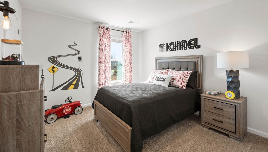 Furnished interior in a model home at Paddock Point in Roebuck (Image 15).