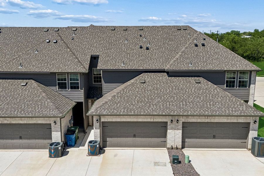 Front exterior of a home in the Sanger Circle – Townhomes community, located in Sanger, TX (Image 33).