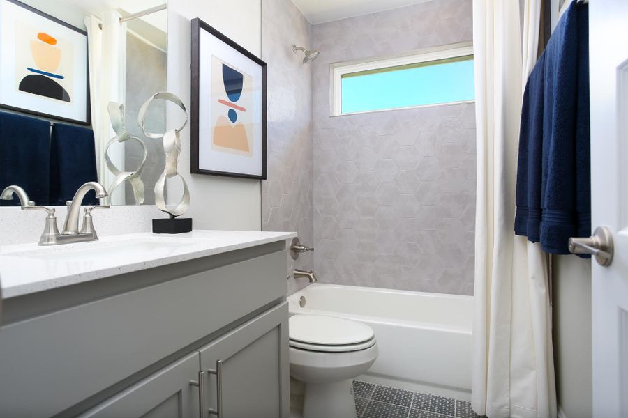 Furnished interior in a model home at Casetta Ranch in Kyle (Image 55).