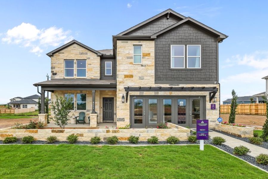 A house with a lawn in front. A house with a lawn in front.