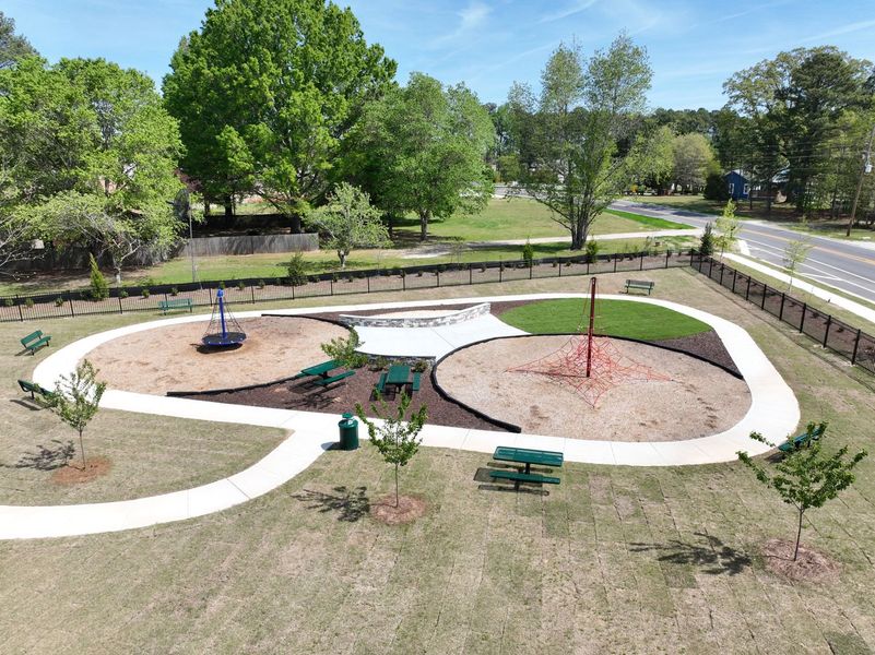 Two neighborhood tot lots for playtime and fresh air Two neighborhood tot lots for playtime and fresh air