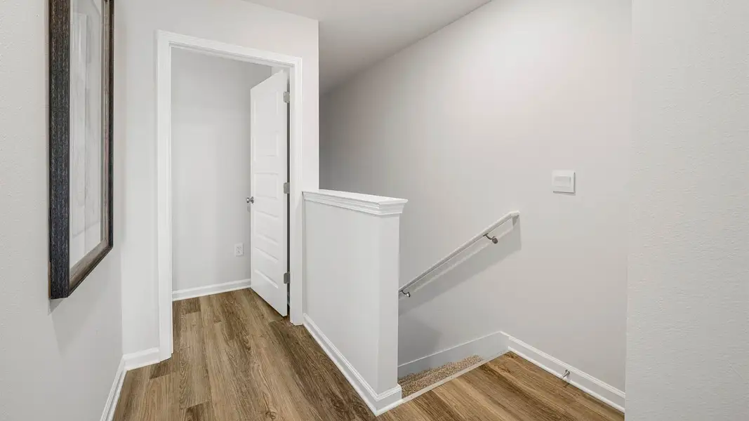 Furnished interior in a model home at Jake's Landing in Lynn Haven (Image 20). Furnished interior in a model home at Jake's Landing in Lynn Haven (Image 20).