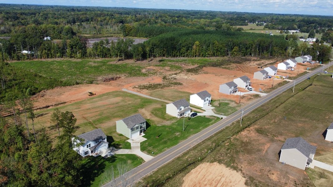 A group of buildings in a field. A group of buildings in a field.