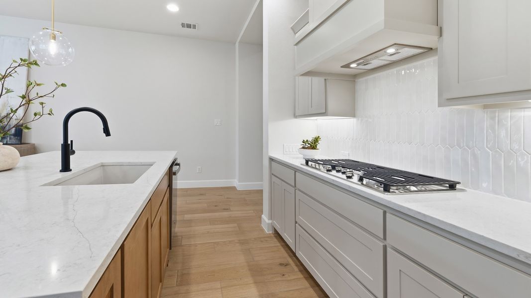 Furnished interior in a model home at Canyon Falls 50' in Northlake (Image 12).