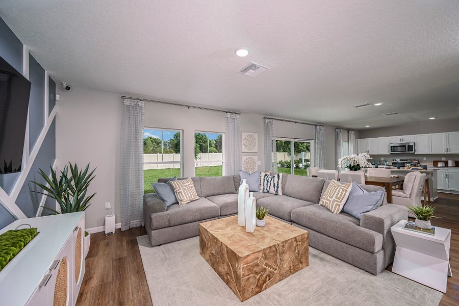 Furnished interior in a model home at Bradbury Creek in Haines City (Image 5).
