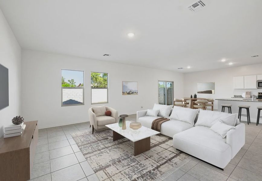Furnished interior in a model home at Bella Vista Farms in San Tan Valley (Image 7).