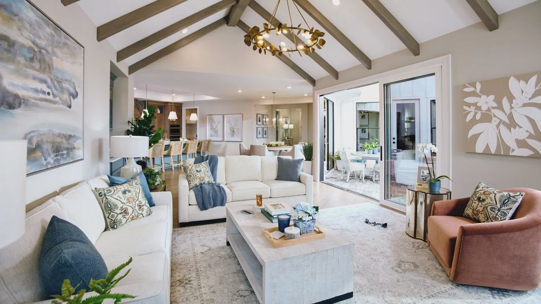 Furnished interior in a model home at The Courtyards at Holly Grove in Holly Springs (Image 3).