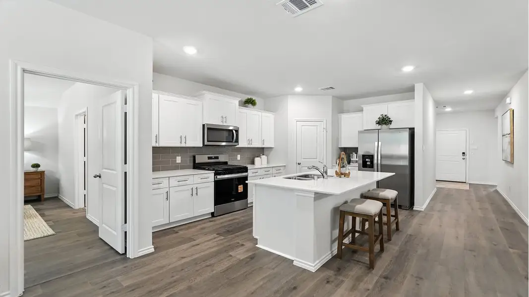 Furnished interior in a model home at The Reserve at Timber Creek in Lindale (Image 1).