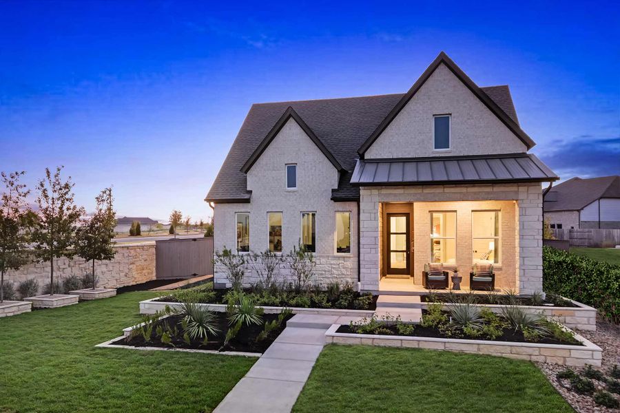 Front exterior of a home in the Flora community, located in Hutto, TX (Image 4).