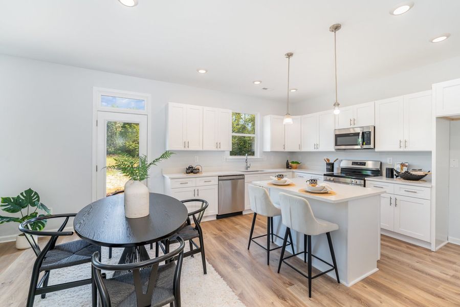 Furnished interior in a model home at Cedars at Camp Greene in Charlotte (Image 3).