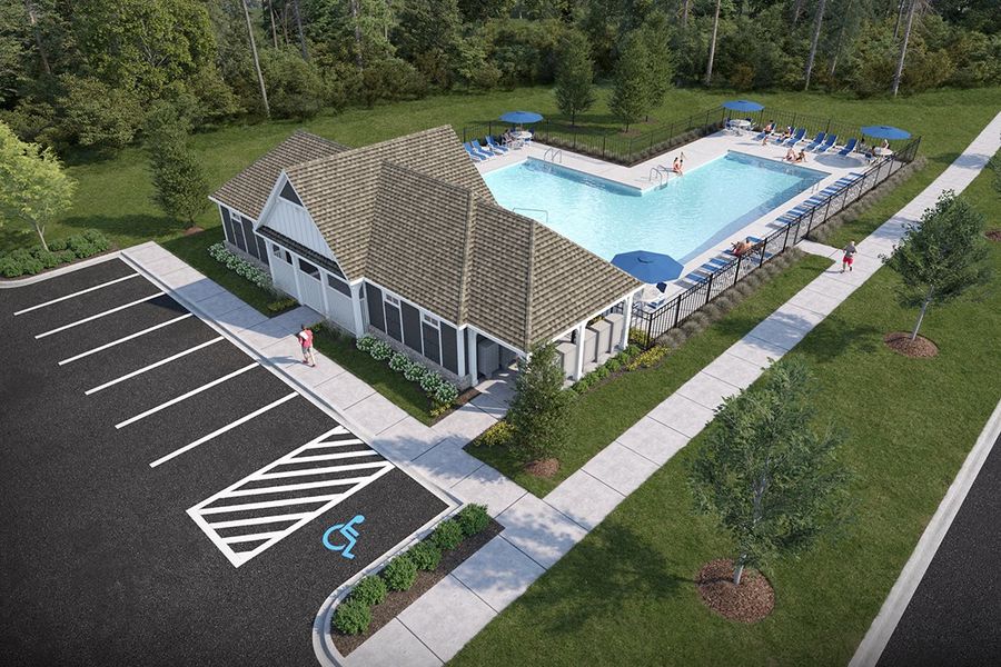 A swimming pool with a building in the background. A swimming pool with a building in the background.