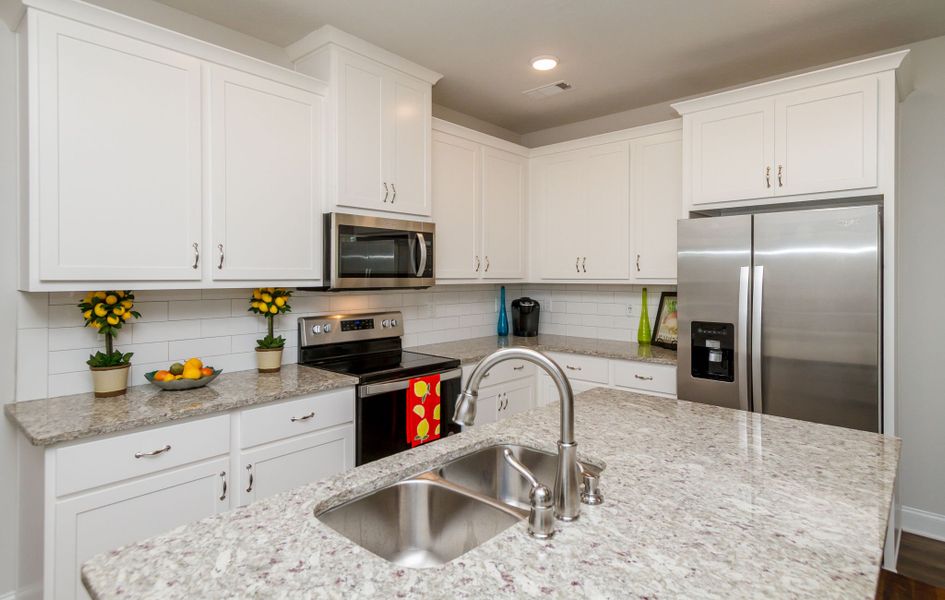 Furnished interior in a model home at Windsor Townhomes in North Augusta (Image 3).