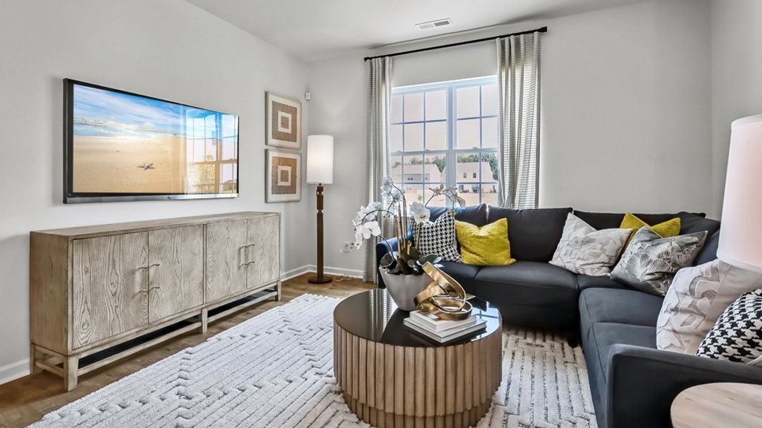 Furnished interior in a model home at The Townes at Prestleigh in Wake Forest (Image 19).