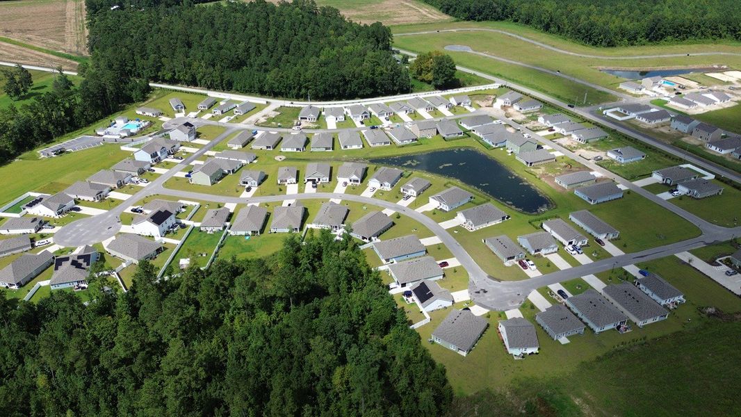 Aerial view of the Cottonwood Place community in Tabor City, NC, showing layout and nearby surroundings (Image 1). Aerial view of the Cottonwood Place community in Tabor City, NC, showing layout and nearby surroundings (Image 1).