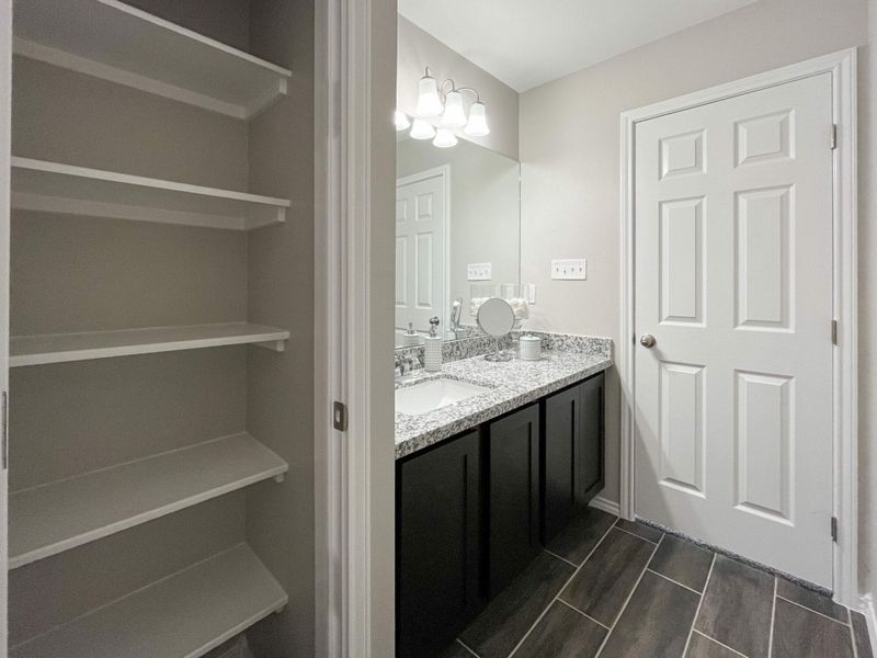 Furnished interior in a model home at Villas San Agustin in Laredo (Image 9).